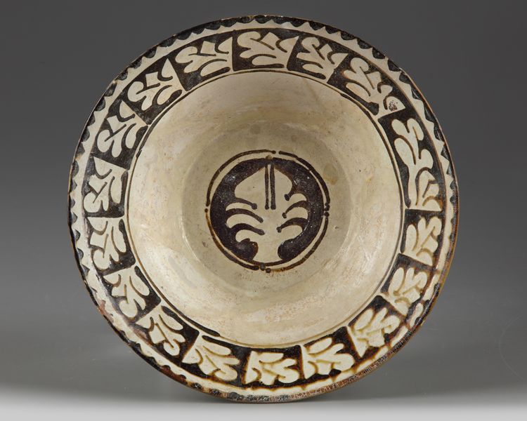 A slip-painted Islamic pottery bowl