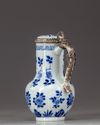 A blue and white silver mounted mik jug