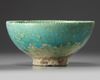 An Islamic turquoise glazed bowl