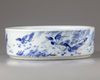 A blue and white porcelain washer