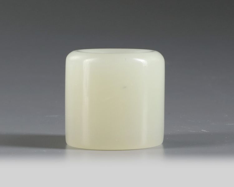 A Chinese white jade archers ring