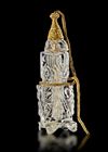 A FATIMID CARVED ROCK CYSTAL BOTTLE,  EGYPT 11TH-12TH CENTURY