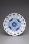 A blue and white porcelain charger