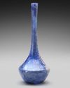A TALL-NECKED BLUE GLASS BOTTLE PERSIA OR SYRIA, 11TH–12TH CENTURY