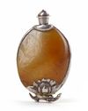 A TIBETAN SILVER-MOUNTED JADE SNUFF BOTTLE, 19TH CENTURY