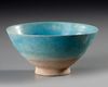 A KASHAN TURQUOISE-GLAZED POTTERY BOWL, PERSIA 12TH-13TH CENTURY