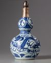 A silver-mounted Chinese blue and white ‘dragon’ double gourd vase