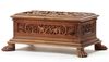 A DEEPLY CARVED SANDALWOOD CHEST WITH HUNTING SCENES