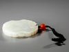 A CHINESE WHITE JADE PLAQUE, 19TH CENTURY