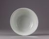 A Chinese Shufu-style white-glazed moulded 'dragon' bowl