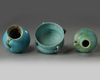Two Islamic turquoise glazed jugs and a bowl