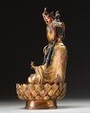 A  Chinese gilt-bronze figure of Avalokitesvara
