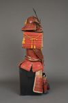 A RED LACQUER JAPANESE SUIT-OF-ARMOUR BY SATSUMA KUNIZUMI, 11TH GENERATION MITSUNOBU, MID 20TH CENTURY