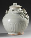 A CHINESE WHITE-GLAZED DRAGON JAR AND COVER,SONG DYNASTY (960-1279)