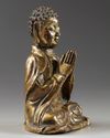 A CHINESE  GILT BRONZE FIGURE OF A BUDDHA, LATE MING DYNASTY, 17TH CENTURY