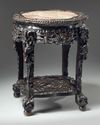 A Chinese pink marble-inset hongmu stand