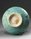 A KASHAN TURQUOISE GLAZED JUG, PERSIA, 13TH CENTURY