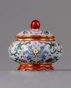 A small famille rose pot and cover