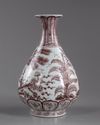 A CHINESE UNDERGLAZE COPPER-RED 'THREE FRIENDS OF WINTER' PEAR-SHAPED VASE, YUHUCHUNPING