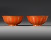 A PAIR OF CHINESE RED GLAZED BOWLS WITH CHARACTERS, 19TH CENTURY