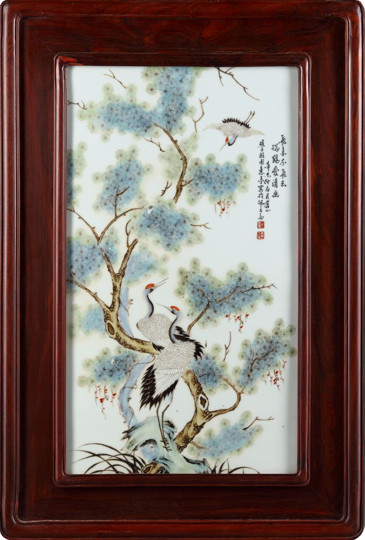 A CHINESE FRAMED FAMILLE ROSE PLAQUE