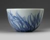 A small Chinese blue and white 'orchid' cup