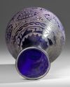 A COBALT BLUE WHEEL-CUT AND ENGRAVED GLASS BOTTLE,MESOPOTAMIA, 10TH–12TH CENTURY