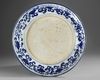 A CHINESE BLUE AND WHITE 'BIRDS' CHARGER, QING DYNASTY (1644–1911)