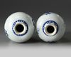 A pair of Chinese blue and white 'flower basket' vases
