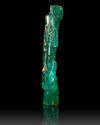A  MUGHAL CARVED EMERALD DEPICTING A PARROT IN A TREE, 19TH CENTURY