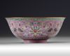 A CHINESE PINK-GROUND FAMILLE ROSE 'BOWL, QING DYNASTY (1611-1911)