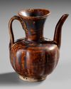 A CHINESE CIZHOU-TYPE BROWN-GLAZED EWER,SONG DYNASTY OR LATER
