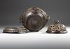 A CHINESE PARCEL-GILT BRONZE 'SEA CREATURES' CENSER, COVER AND STAND