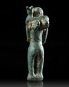 A WESTERN ASIATIC BRONZE STATUETTE OF MAN CARRYING AN ANIMAL, CIRCA 3RD MILLENNIUM B.C.
