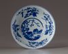 A Chinese famille rose yellow-ground sgraffiato 'Three Rams' medallion bowl