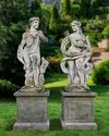A PAIR OF SCULPTED LIMESTONE LIFESIZE FIGURES OF APOLLO AND DIANA, 20TH CENTURY