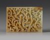 A  CHINESE JADE OPENWORK DRAGON PLAQUE