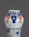 A Chinese wucai glazed 'dragons' garlic-head vase