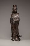 A large bronze figure of Guanyin