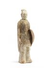 A Chinese painted pottery model of a standing warrior