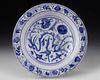 A SAFAVID BLUE AND WHITE POTTERY DISH, PERSIA, 16TH CENTURY