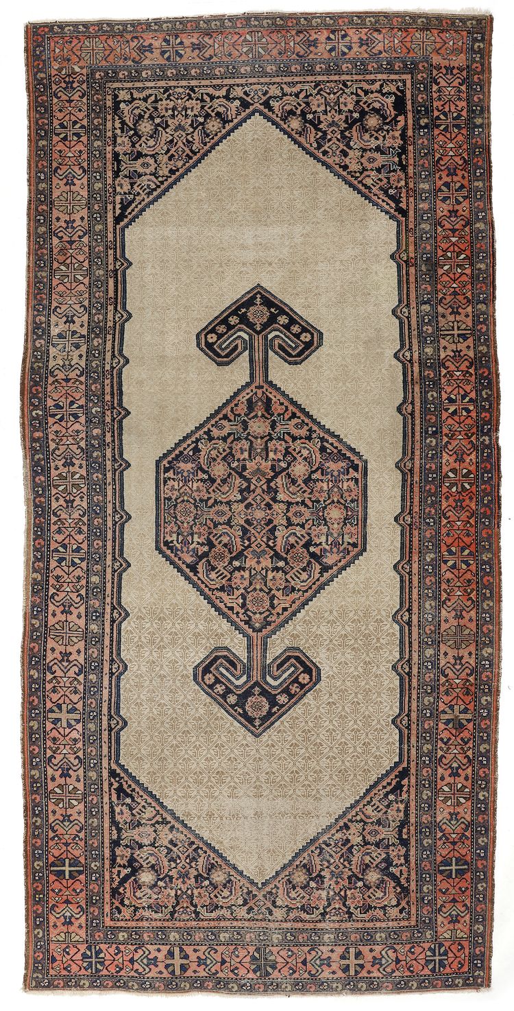 A CAMEL BACKGROUND MALAYER CARPET.