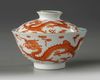A Chinese white-ground sgraffiato iron-red-decorated 'dragon' bowl and cover