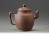 A Chinese Yixing teapot and cover