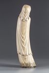 A CHINESE IVORY FIGURE OF GUANDI