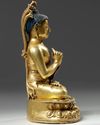 A Tibetan gilt bronze figure of an Amitayus