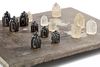 AN EXTREMELY RARE CHESS BOARD MADE OF SOLID SILVER AND DATING TO THE FATIMID PERIOD 909-1170 AD AND INSCRIBED WITH A POEM BY ‘UMARA AL-YAMANI’
