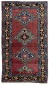 AN ANTIQUE KARABAG RUG