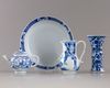 A group of four blue and white objects