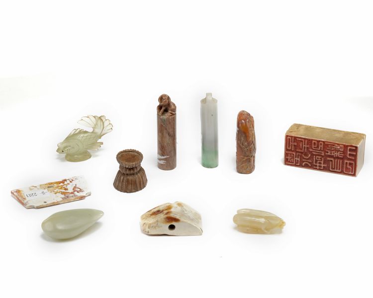 A group of Chinese jade and soapstone carvings